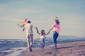 Image showing happy family enjoying vecation during autumn day