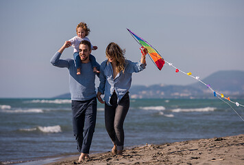 Image showing happy family enjoying vecation during autumn day