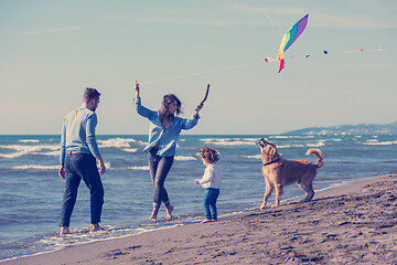 Image showing happy young family enjoying vecation during autumn day