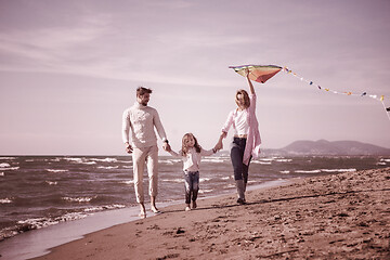 Image showing happy family enjoying vecation during autumn day