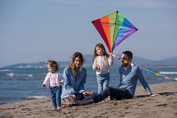 Image showing happy family enjoying vecation during autumn day