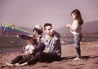 Image showing happy family enjoying vecation during autumn day