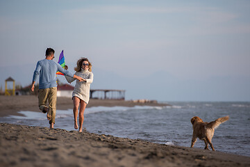 Image showing happy couple enjoying time together at beach