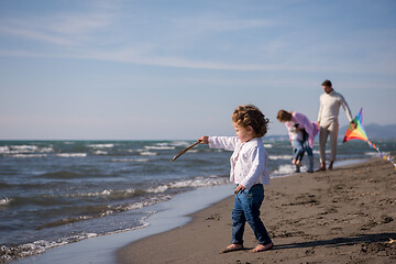 Image showing happy family enjoying vecation during autumn day