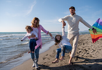 Image showing happy family enjoying vecation during autumn day