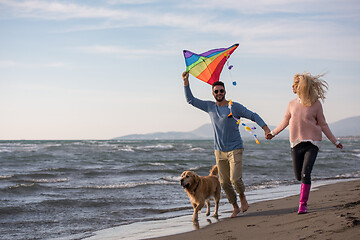 Image showing happy couple enjoying time together at beach