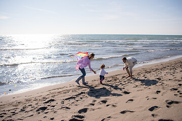 Image showing happy family enjoying vecation during autumn day