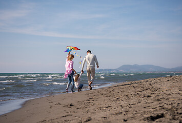 Image showing happy family enjoying vecation during autumn day