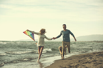 Image showing happy couple enjoying time together at beach