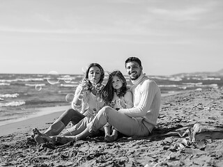 Image showing Young family enjoying vecation during autumn day