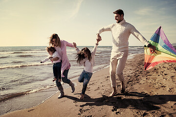 Image showing happy family enjoying vecation during autumn day