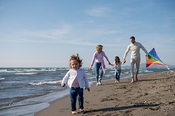 Image showing happy family enjoying vecation during autumn day