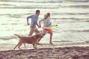 Image showing happy couple enjoying time together at beach