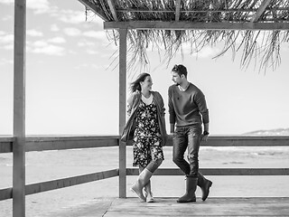 Image showing Couple chating and having fun at beach bar