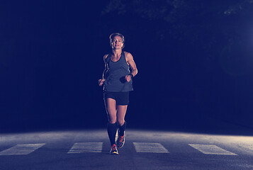 Image showing female runner training for marathon