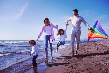 Image showing happy family enjoying vecation during autumn day