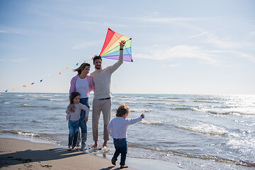 Image showing happy family enjoying vecation during autumn day