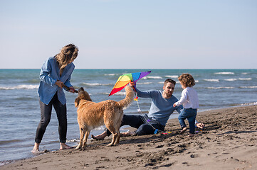 Image showing happy young family enjoying vecation during autumn day