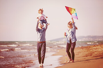 Image showing happy family enjoying vecation during autumn day