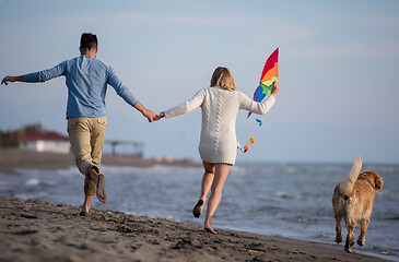 Image showing happy couple enjoying time together at beach