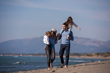 Image showing Young family enjoying vecation during autumn