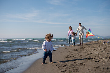 Image showing happy family enjoying vecation during autumn day