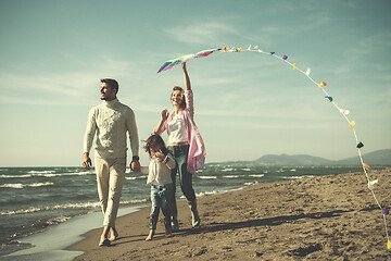 Image showing happy family enjoying vecation during autumn day