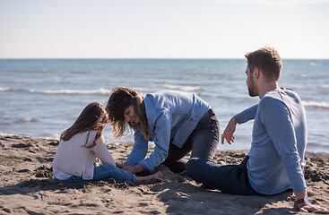 Image showing Young family enjoying vecation during autumn