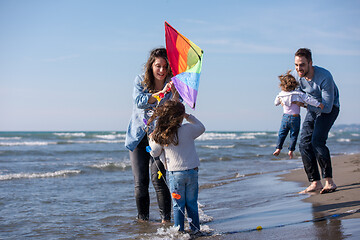 Image showing happy family enjoying vecation during autumn day