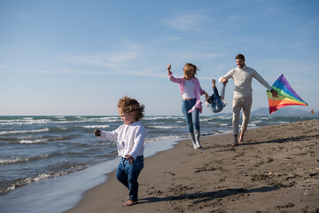 Image showing happy family enjoying vecation during autumn day