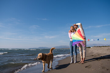 Image showing happy couple enjoying time together at beach