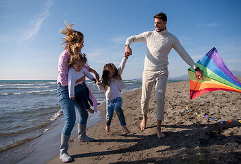 Image showing happy family enjoying vecation during autumn day