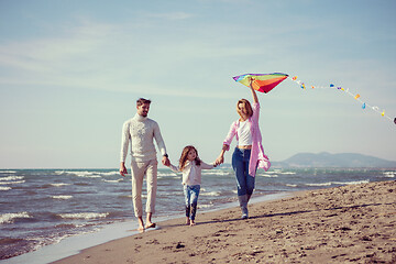 Image showing happy family enjoying vecation during autumn day