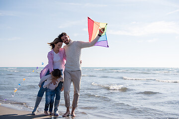 Image showing happy family enjoying vecation during autumn day