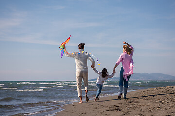 Image showing happy family enjoying vecation during autumn day