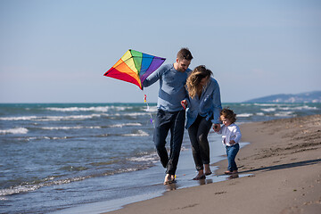 Image showing happy family enjoying vecation during autumn day