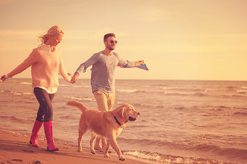 Image showing happy couple enjoying time together at beach