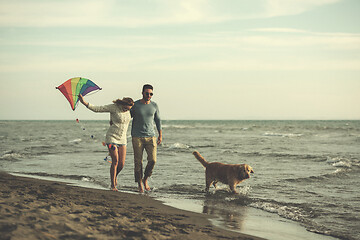 Image showing happy couple enjoying time together at beach