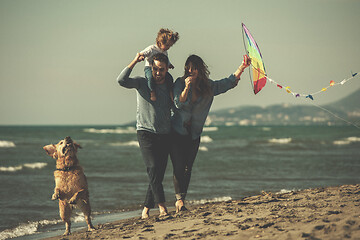 Image showing happy young family enjoying vecation during autumn day