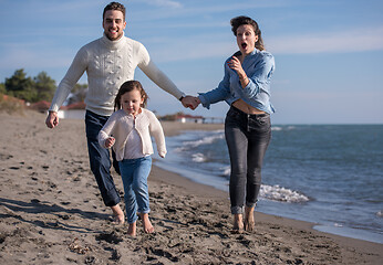 Image showing Young family enjoying vecation during autumn