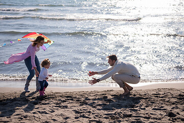 Image showing happy family enjoying vecation during autumn day