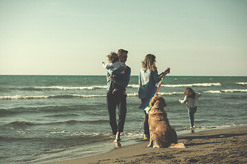 Image showing happy young family enjoying vecation during autumn day