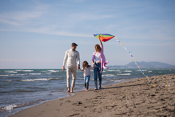 Image showing happy family enjoying vecation during autumn day