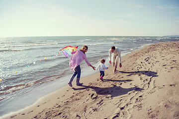 Image showing happy family enjoying vecation during autumn day