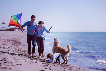 Image showing happy young family enjoying vecation during autumn day