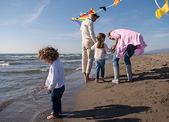 Image showing happy family enjoying vecation during autumn day