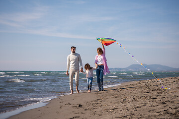 Image showing happy family enjoying vecation during autumn day