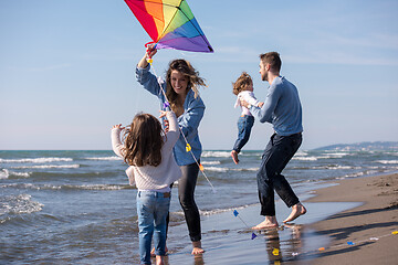 Image showing happy family enjoying vecation during autumn day