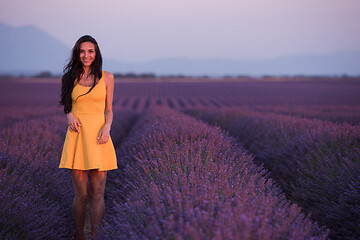 Image showing woman in yellow dress at lavender field