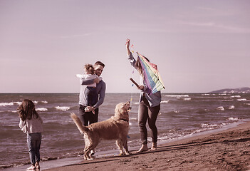 Image showing happy young family enjoying vecation during autumn day